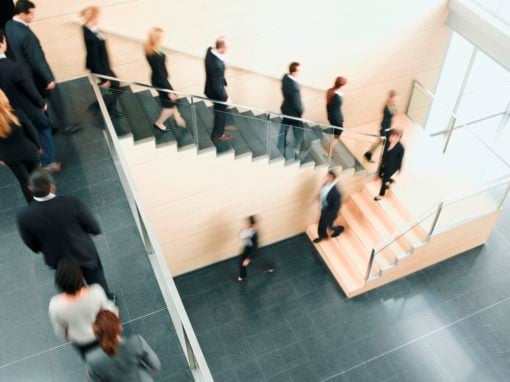 people walking down stairs during emergency evacuation, according to evacuation plan and emergency action plan