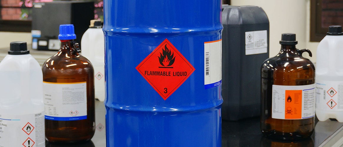 Flammable liquids marked with flammable warning label
