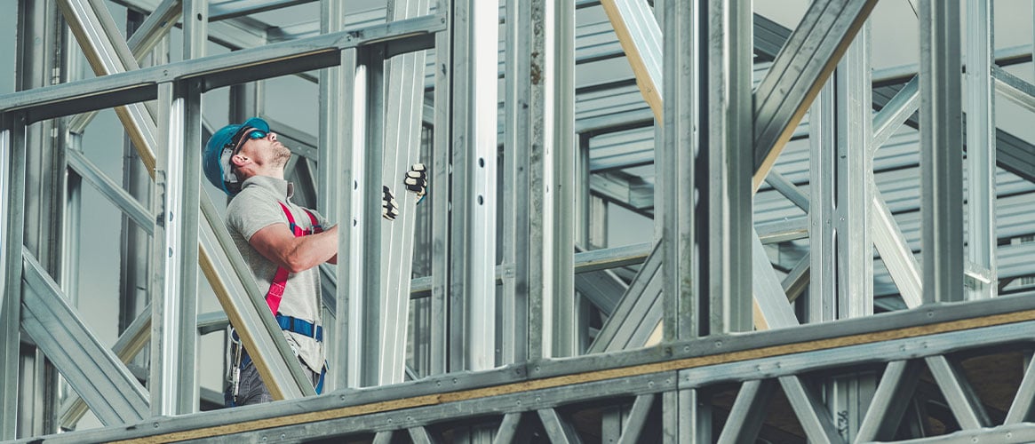 Construction worker on a light gage steel structure.